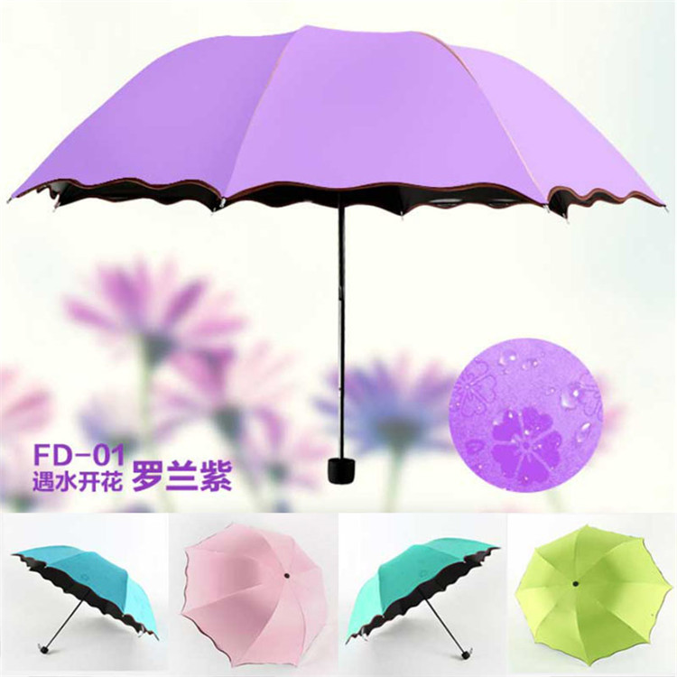 雨傘女三折傘太陽傘黑膠防曬防紫外線晴雨傘創意折疊傘遇水開花傘